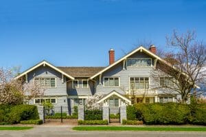 Large Blue House with Gated Entrance